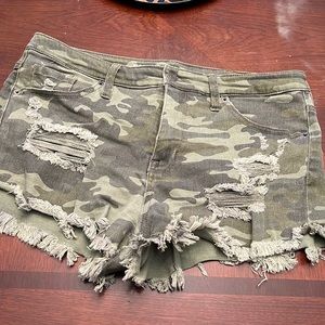 Ripped camo shorts